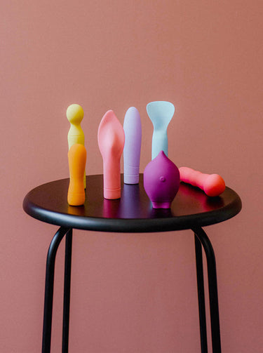 smile makers vibrators on a stool